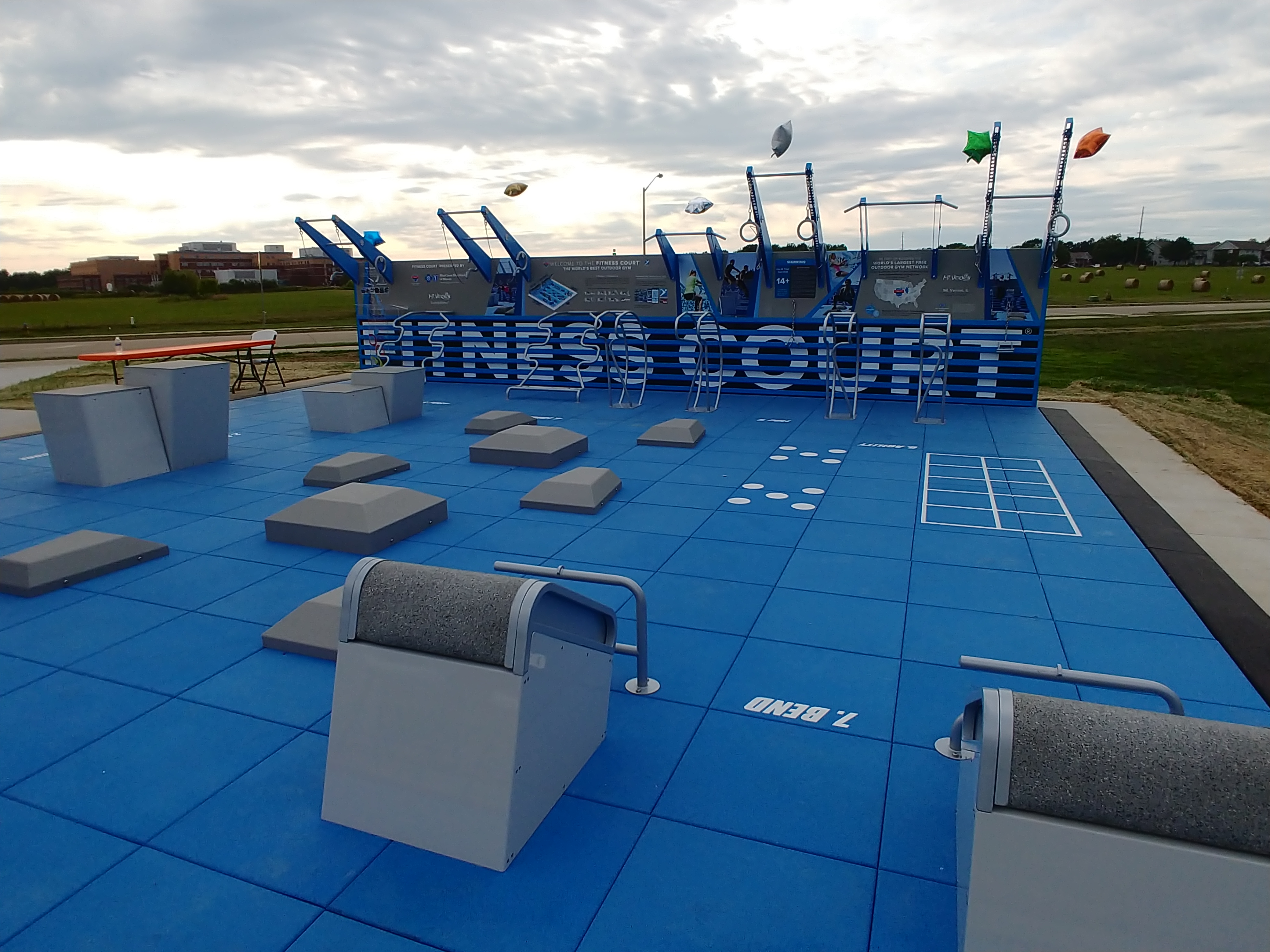 Outdoor court with exercise equipment
