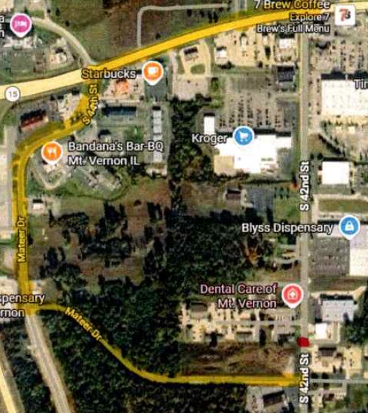 Aerial map showing businesses, roads, and trees